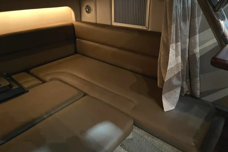 Slide: The Image of Interior of 2011 Crownline 350 CR with cozy seating area. - 30