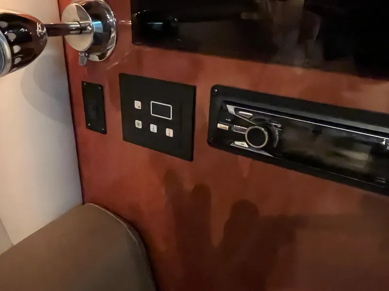 Slide: The Image of Interior view of 2011 Crownline 350 CR with control panel. - 31
