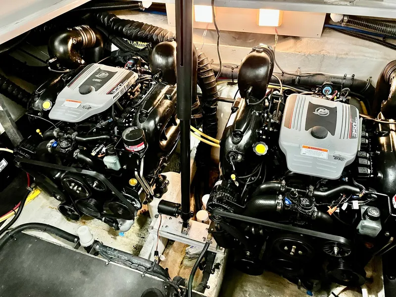 Slide: The Image of Dual engines in a 2011 Crownline 350 CR boat. - 35
