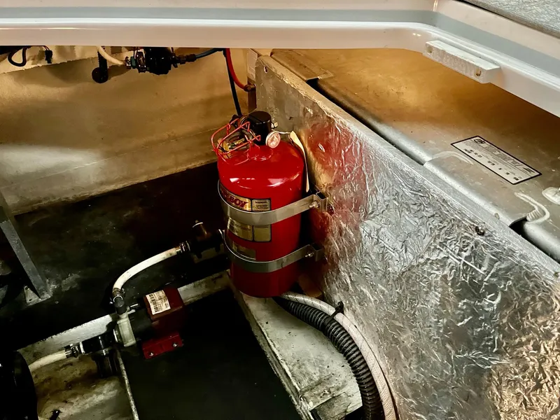 Slide: The Image of Fire extinguisher in engine room of 2011 Crownline 350 CR yacht. - 40