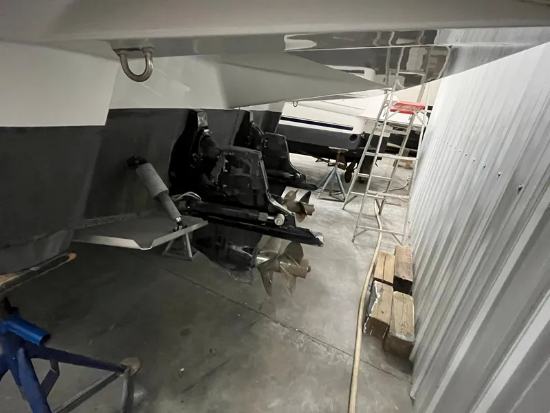 Slide: The Image of Rear view of a 2011 Crownline 350 CR yacht in dry dock. - 43