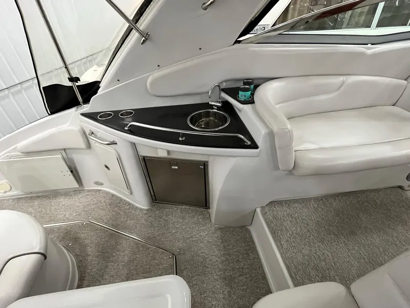 Slide: The Image of Interior of a 2011 Crownline 350 CR yacht with sink and seating area. - 7