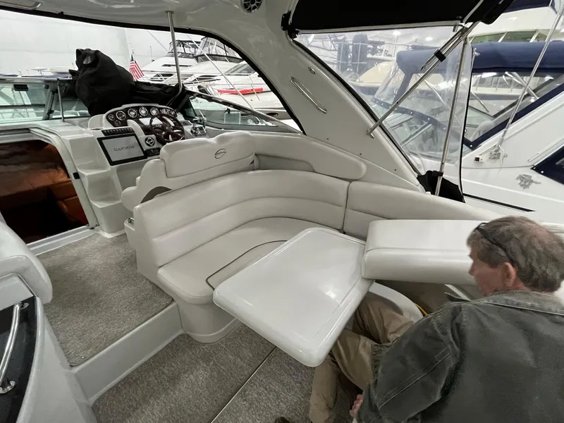 Slide: The Image of Interior of a 2011 Crownline 350 CR yacht with seating area. - 8