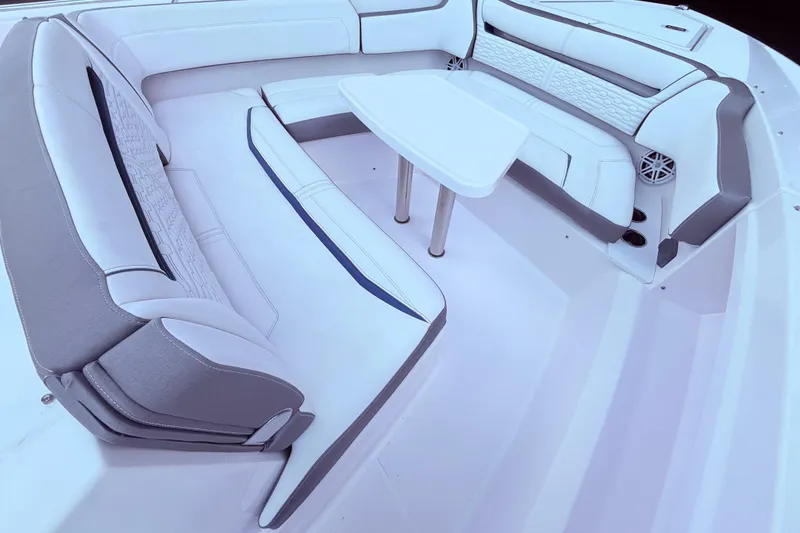 Slide: The Image of Luxurious seating area on 2022 Tiara Yachts 38 LS with elegant white upholstery. - 11