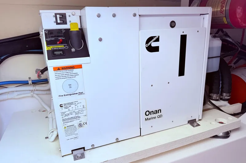 Slide: The Image of Cummins Onan Marine QD generator in 2022 Tiara Yachts 38 LS engine room. - 13