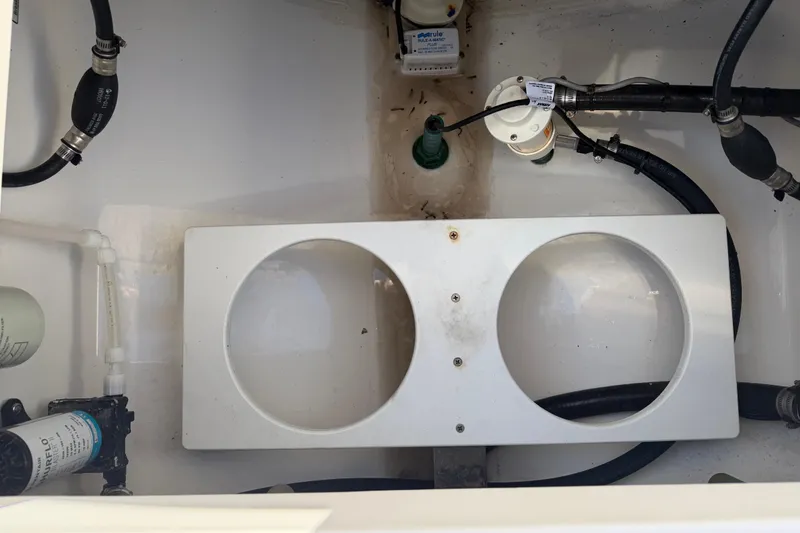 Slide: The Image of Display screen showing trip data for a 2019 Regulator 25 boat, including fuel usage and hours. - 26