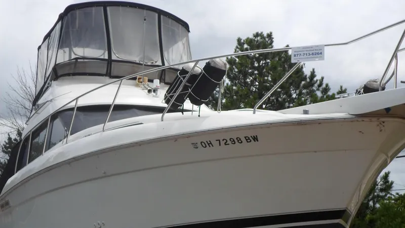 Slide: The Image of 1993 Silverton 37 Convertible boat with registration OH 7298 BW. - 11
