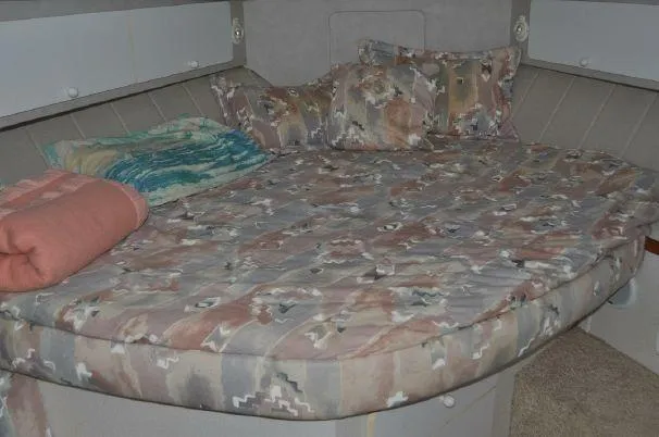 Slide: The Image of 1993 Silverton 37 Convertible interior with cozy bed. - 18