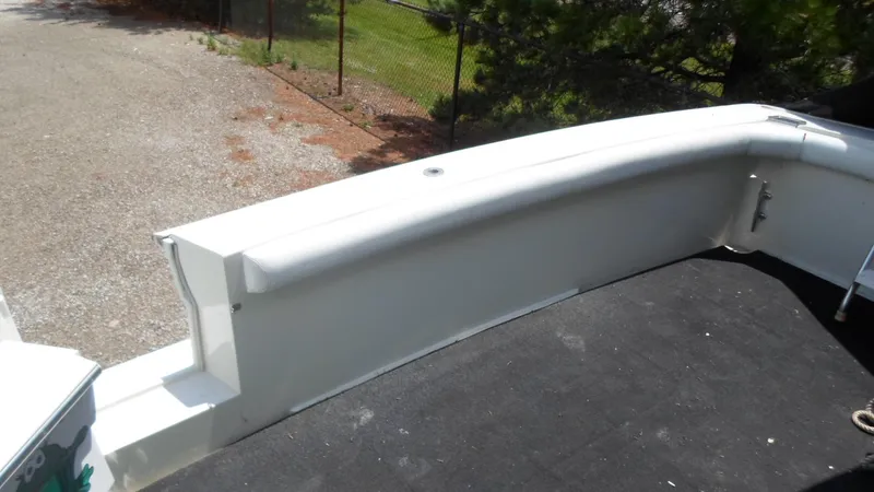 Slide: The Image of 1993 Silverton 37 Convertible boat deck, white, outdoor setting. - 6