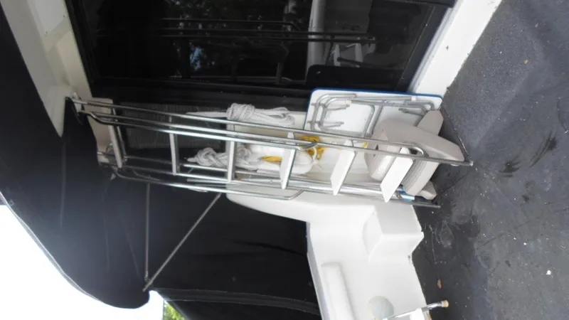 Slide: The Image of 1993 Silverton 37 Convertible boat deck with ladder. - 9