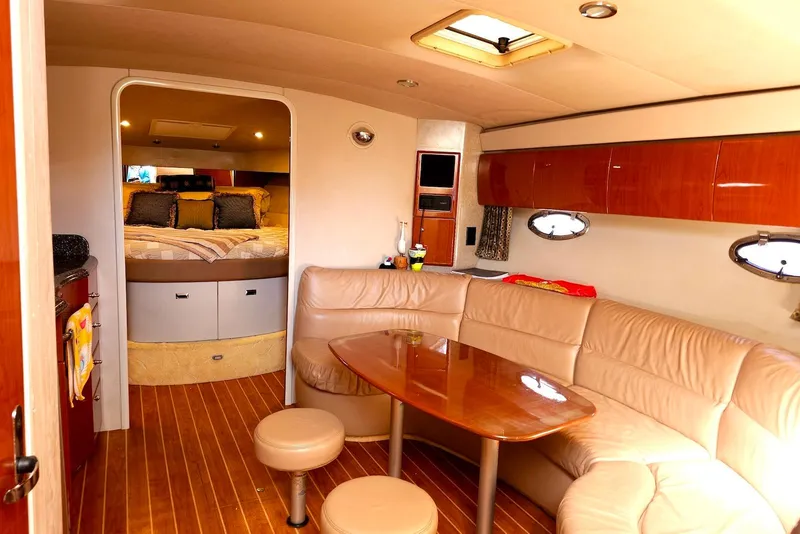 Slide: The Image of Luxurious interior of a 2004 Formula 40 Performance Cruiser with leather seating and wood finishes. - 10