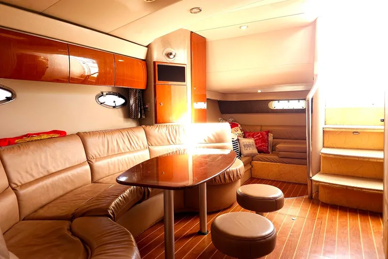 Slide: The Image of Luxurious interior of 2004 Formula 40 Performance Cruiser with leather seating and wooden accents. - 12