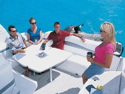 Slide: The Image of 2004 Formula 40 Performance Cruiser interior with white seating and panoramic windows. - 2