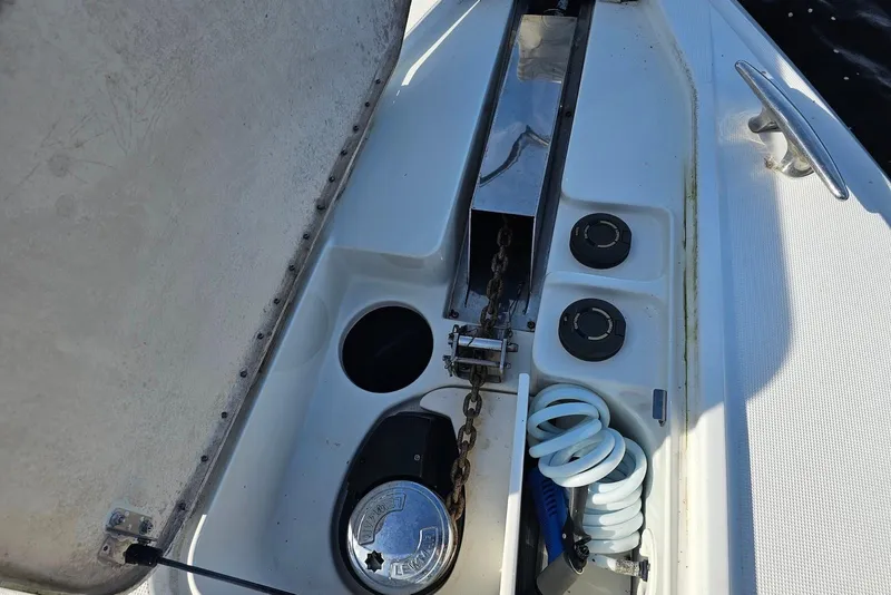 Slide: The Image of Anchor compartment of 2004 Formula 40 Performance Cruiser with chain and hose storage. - 9