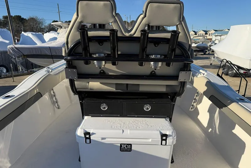 Slide: The Image of 2026 Key West 239 FS boat interior with seating and storage features. - 11