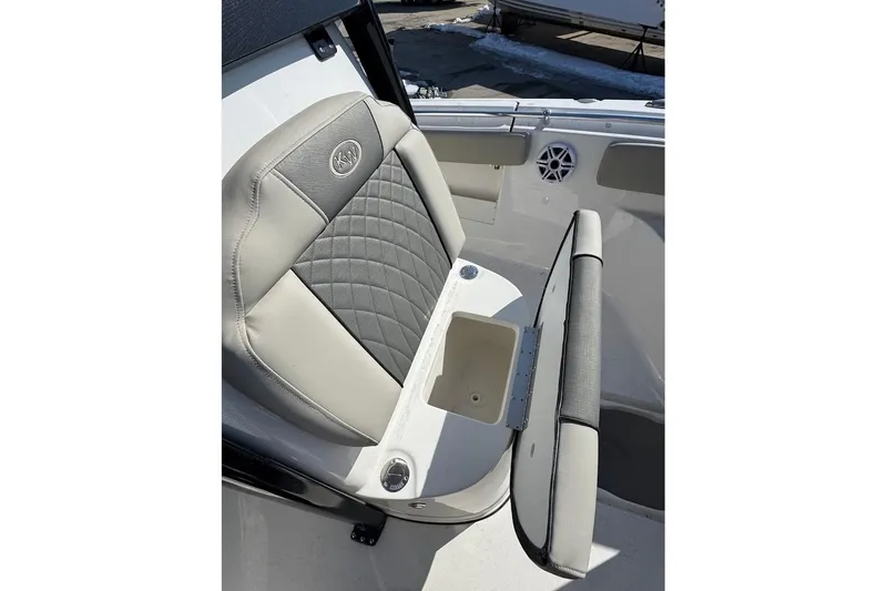 Slide: The Image of 2026 Key West 239 FS boat seat with storage compartment open. - 23