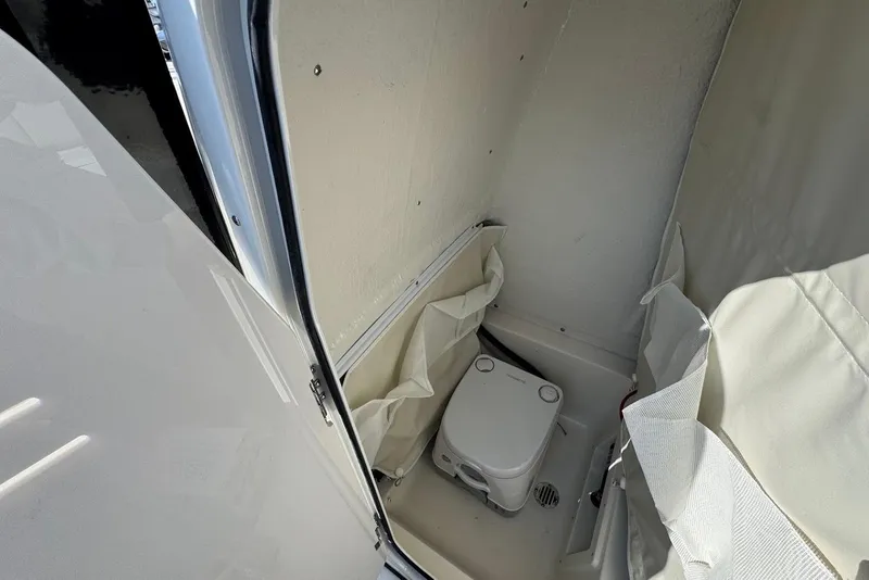 Slide: The Image of Compact marine toilet in 2026 Key West 239 FS boat cabin. - 26