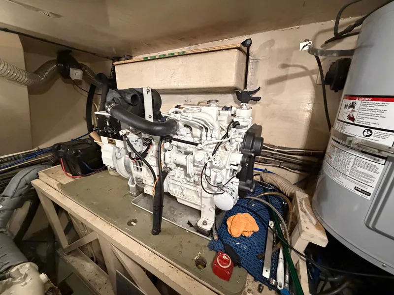 Slide: The Image of Interior of a 1975 Hatteras 58L Long Range Cruiser with wooden cabinetry. - 35