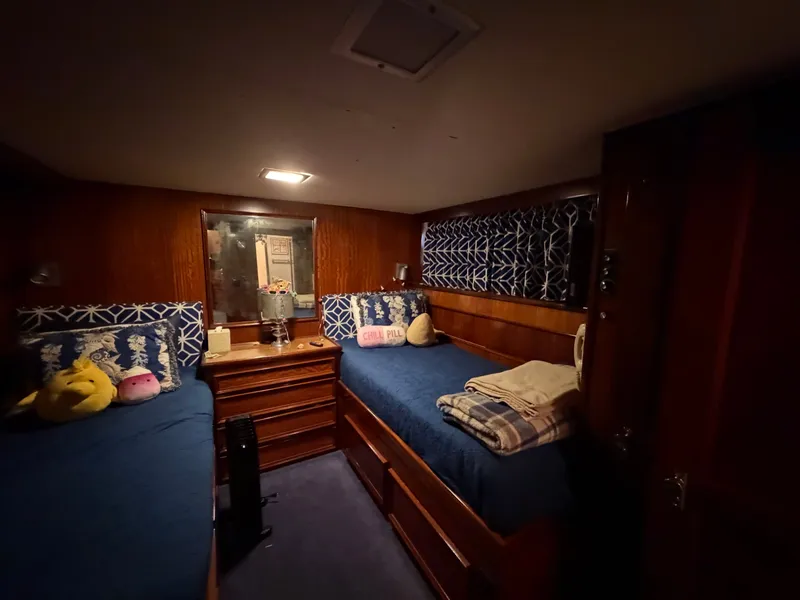 Slide: The Image of Interior of 1975 Hatteras 58L Long Range Cruiser, cozy cabin with beds. - 45