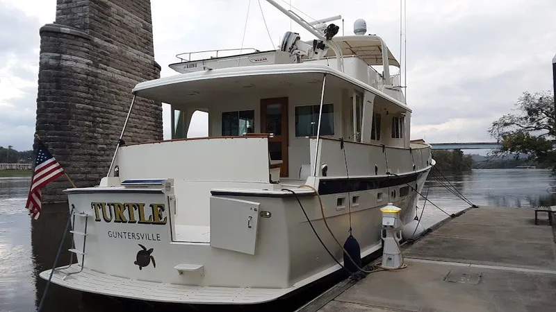 Slide: The Image of 1975 Hatteras 58L Long Range Cruiser at dock. - 6