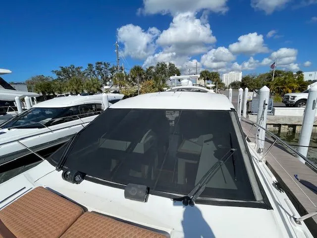 Slide: The Image of Close-up of a 2016 Sea Ray 510 DA with Rotax Power logo. - 12