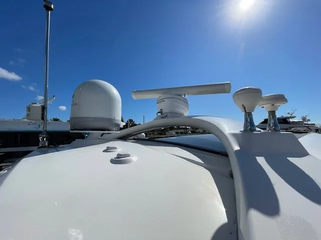 Slide: The Image of Luxury Sea Ray 510 DA 2016 yacht docked, featuring a comfortable seating area. - 14