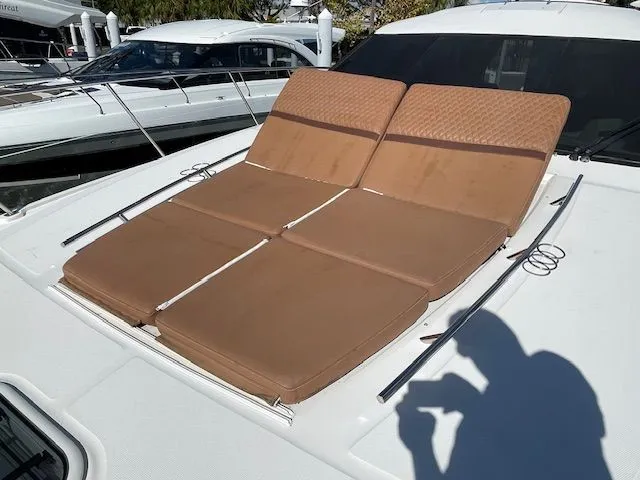 Slide: The Image of Storage compartment on a 2016 Sea Ray 510 DA with boating gear. - 17