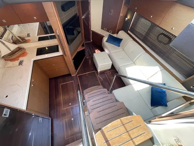 Slide: The Image of Interior of a 2016 Sea Ray 510 DA yacht with modern amenities. - 24