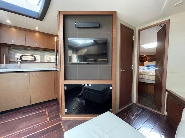 Slide: The Image of Interior of a 2016 Sea Ray 510 DA yacht with teak flooring. - 27