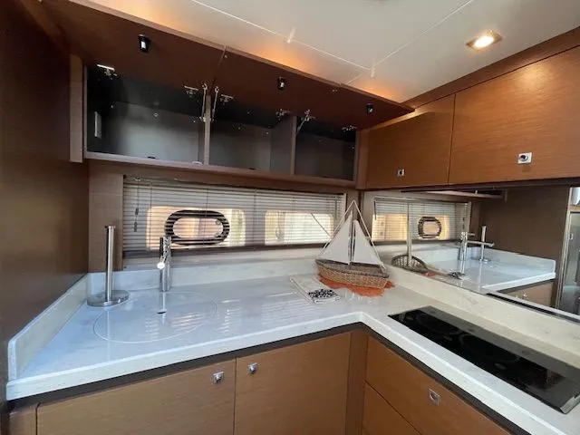Slide: The Image of Interior view of a 2016 Sea Ray 510 DA yacht at dock. - 34