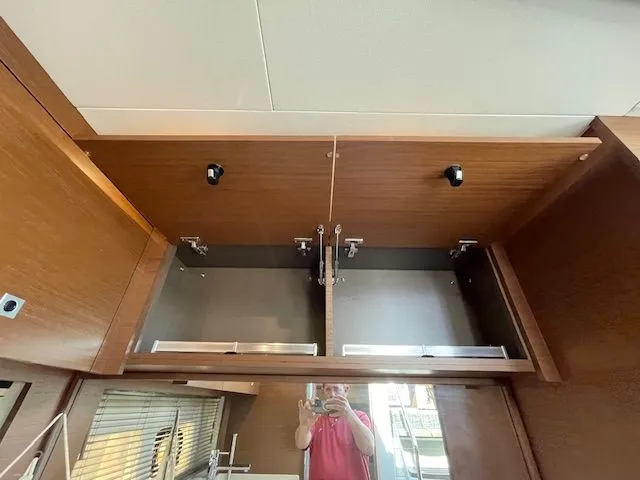 Slide: The Image of Interior view of a 2016 Sea Ray 510 DA yacht overlooking the marina. - 35