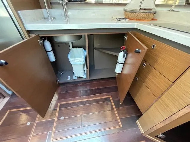 Slide: The Image of Interior of a 2016 Sea Ray 510 DA yacht with luxurious seating area. - 39