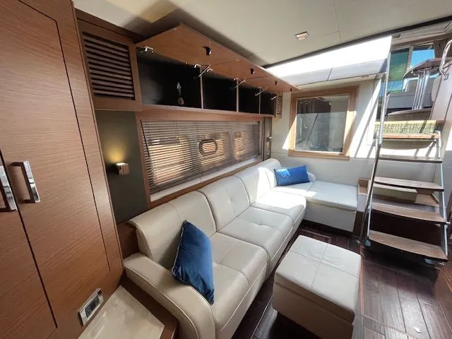 Slide: The Image of Interior of a 2016 Sea Ray 510 DA yacht with leather seating. - 43