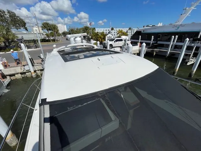 Slide: The Image of 2016 Sea Ray 510 DA yacht docked with jet ski. - 9