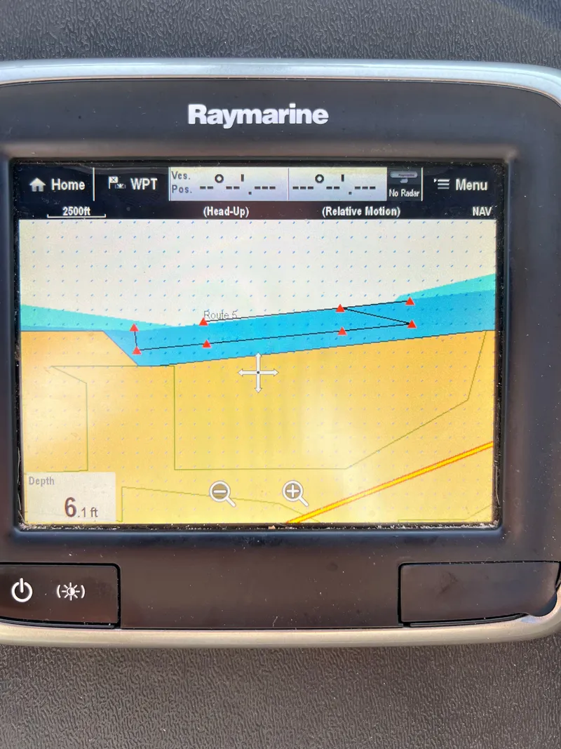 Slide: The Image of Raymarine navigation system on Doral 300 SC boat, displaying route and depth. - 5