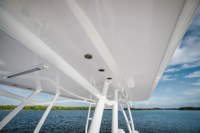 Slide: The Image of 2024 Birdsall 30 boat canopy over water with clear sky. - 18