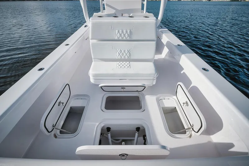 Slide: The Image of 2024 Birdsall 30 boat interior with open storage compartments on the water. - 29