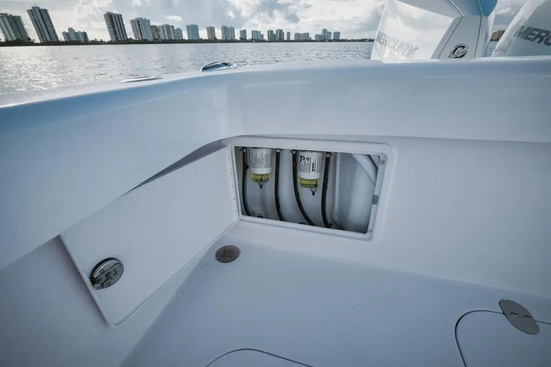 Slide: The Image of 2024 Birdsall 30 boat with open storage compartment and water view. - 32