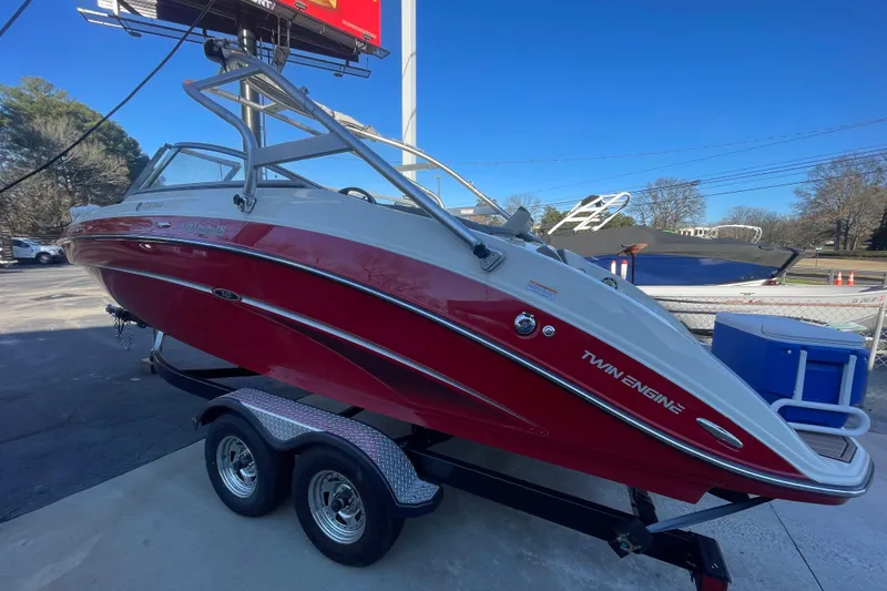 The Image of 2014 Yamaha Boats 242 Limited S, red and white, twin engine, on trailer. - 0