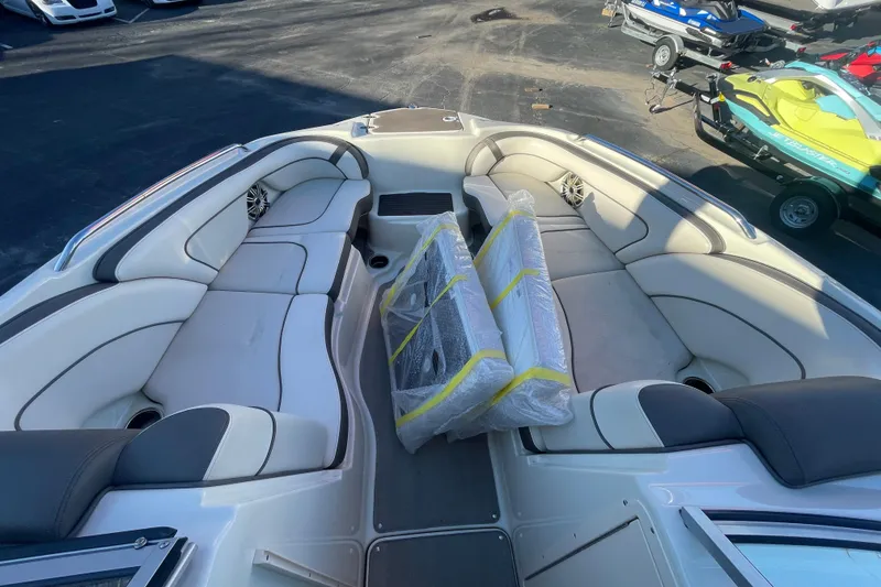 Slide: The Image of 2014 Yamaha Boats 242 Limited S interior with spacious seating and modern design. - 10