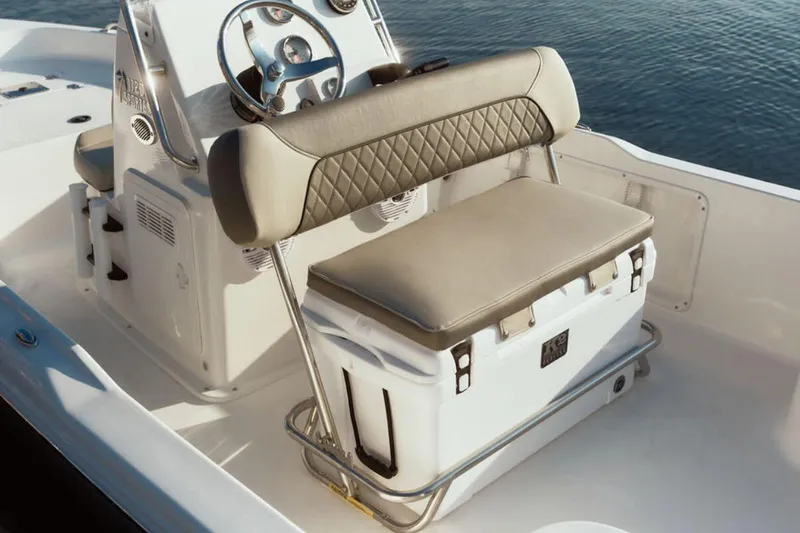 Slide: The Image of Manufacturer Provided Image: 2025 Key West 1720 Center Console boat interior with cushioned seating and steering wheel. - 5