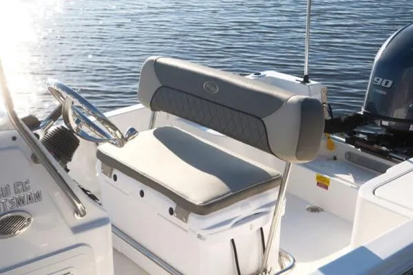 Slide: The Image of Manufacturer Provided Image: 2025 Key West 1720 Center Console boat interior with steering wheel and seating. - 6