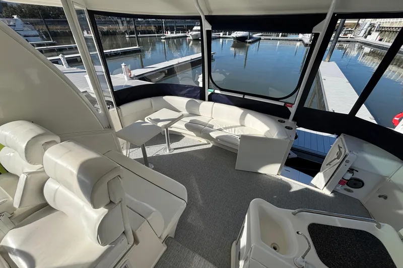 Slide: The Image of 2005 Cruisers Yachts 455 Express Motoryacht interior with Strataglass Enclosure and new Grassmat flooring - 3