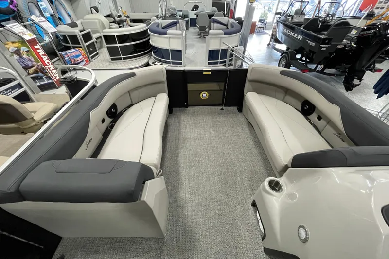 Slide: The Image of 2026 Barletta Sanza S22QC Tri pontoon boat interior with plush seating and modern design. - 10