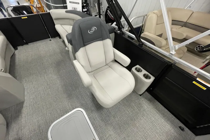 Slide: The Image of 2026 Barletta Sanza S22QC Tri interior with plush seating and cup holders. - 13