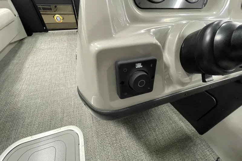 Slide: The Image of 2026 Barletta Sanza S22QC Tri boat dashboard with JBL audio control. - 17