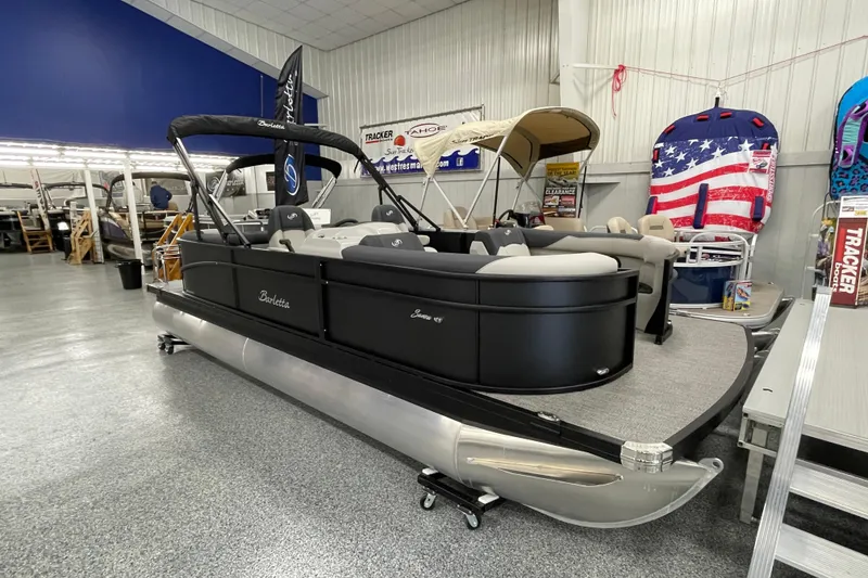 The Image of 2026 Barletta Sanza S22QC Tri pontoon boat displayed in showroom. - 5