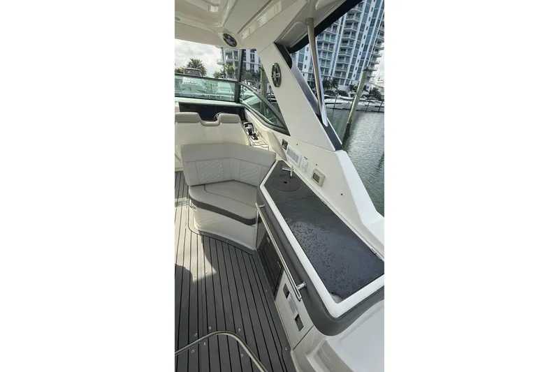 Slide: The Image of 2021 Sea Ray Sundancer 320 interior with sleek seating and modern design. - 19