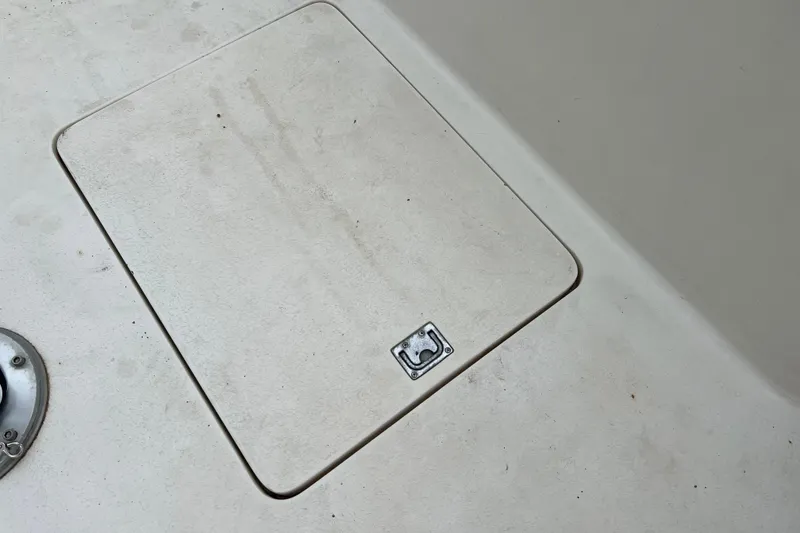 Slide: The Image of Deck hatch on a 1996 Henriques 28 Express boat. - 6