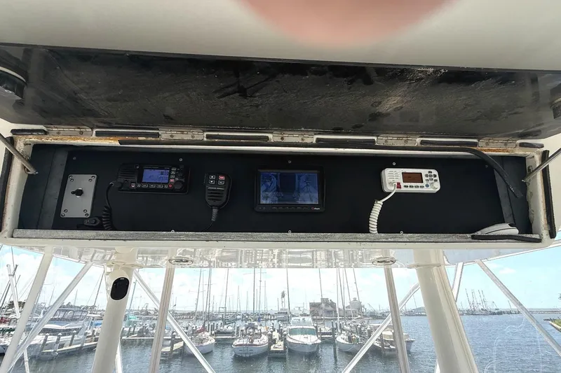 Slide: The Image of Control panel of a 1995 Bertram 43 Convertible boat with marine electronics. - 5